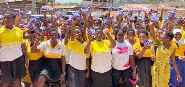 Some of the beneficiaries displaying their sanitary towels Some of the beneficiaries displaying their sanitary towels